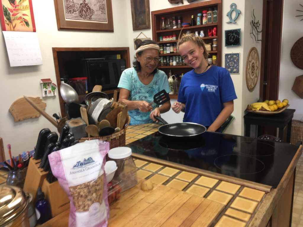 Rosie and friend in the kitchen shared housing in Hawaii